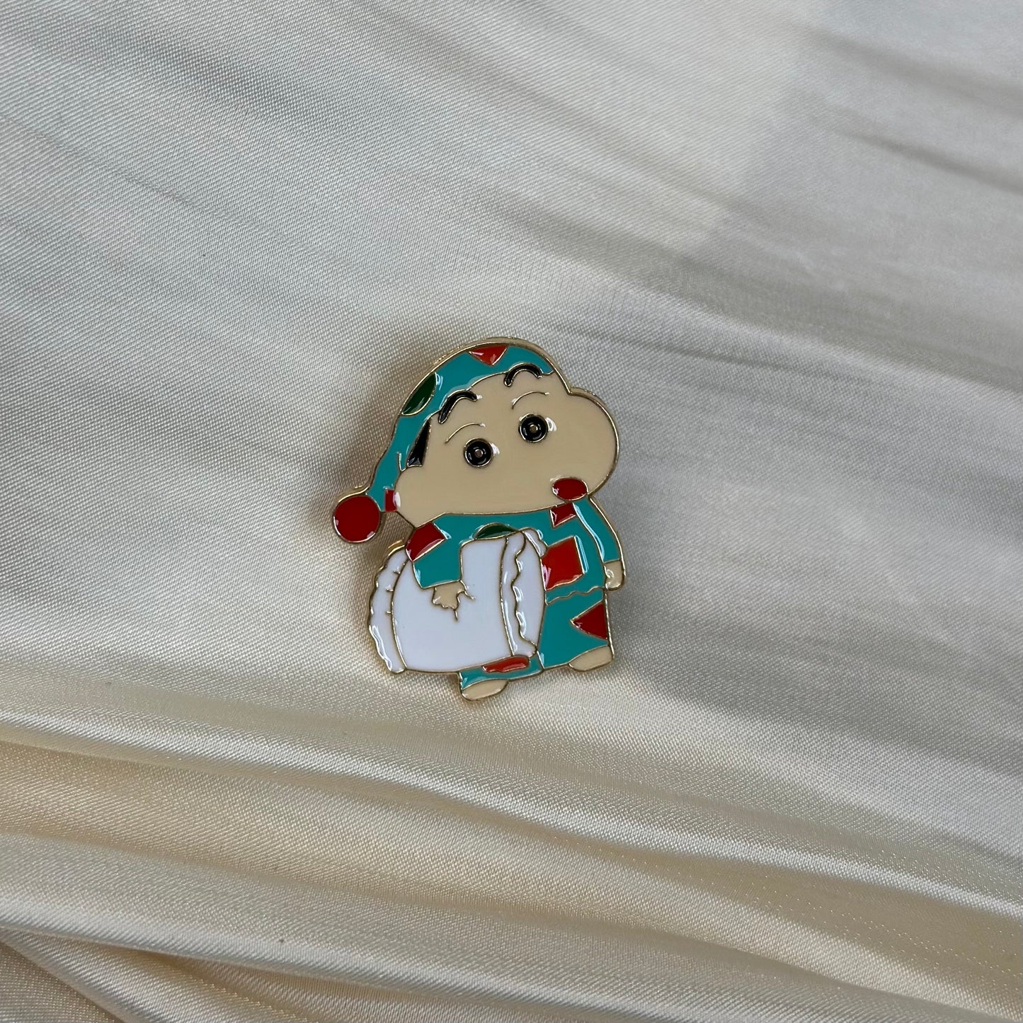 クレヨンしんちゃんのブローチ
