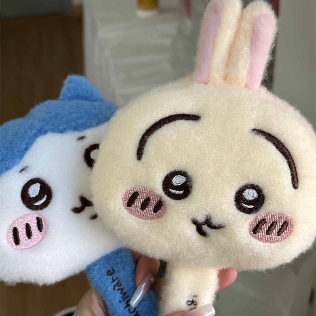 手鏡を持ってい